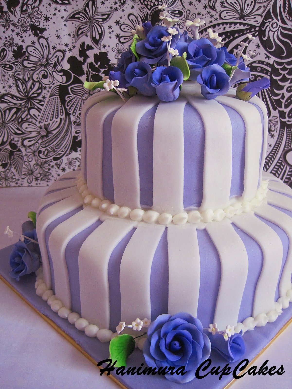 green and purple wedding cake