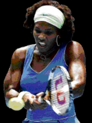 DETERMINED: Serena Williams returns the ball to Argentina's Gisela Dulko during their women's singles match at the Australian Open yesterday. 22/01/2009. © AP Photo. Pic. Rob Griffith.