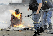 Mozambican Ernesto Nhamuave was set alight by a mob in Ramaphosa informal settlement on the East Rand in May 2008