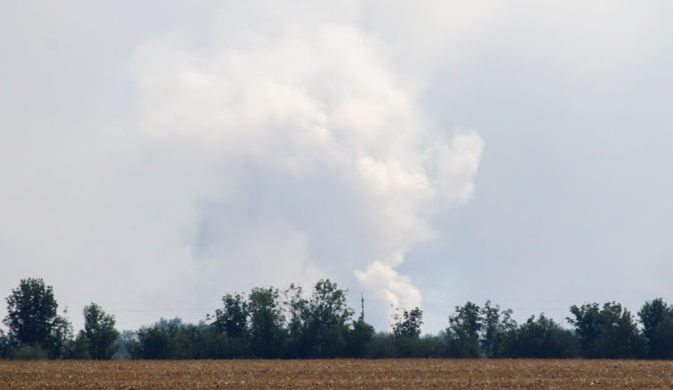 A view shows smoke rising above the area following an alleged explosion in the village of Mayskoye in the Dzhankoi district, Crimea, on August 16 2022. Picture: REUTERS