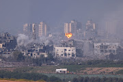 Smoke rises from an explosion in Gaza on October 28 2023 in Sderot, Israel. 