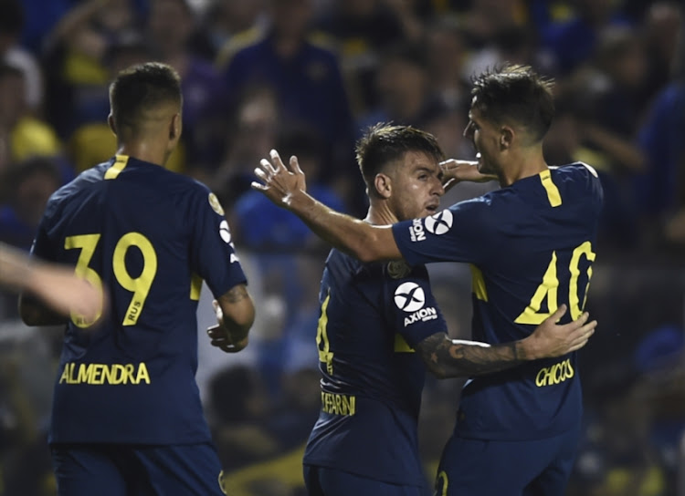 Julio Buffarini of Boca Juniors celebrates with teammates after scoring the fourth goal of his team during a match between Boca Juniors and Tigre as part of Superliga 2018/19 at Estadio Alberto J. Armando on November 3, 2018 in Buenos Aires, Argentina.