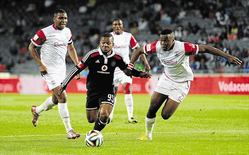 CATCH ME IF YOU CAN: Kermit Erasmus of Pirates loses his Free State Stars markers last night Picture: GALLO IMAGES