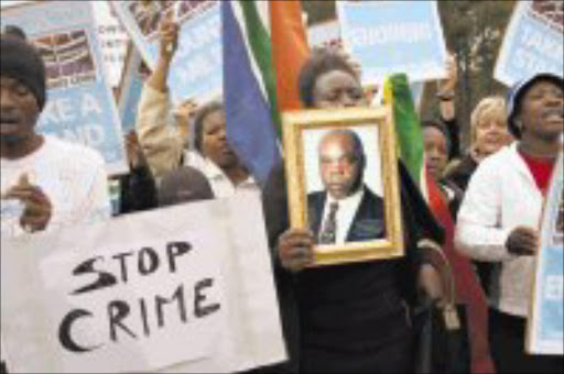 STAND MADE: A section of the crowd in Pretoria yesterday who took part in the Million Man March. Pic. Munydziwa Nemutudi. 10/06/08. © Sowetan.