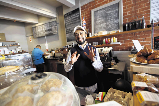 Muhammed Lameen Abdul-Malik is a world away from the International Atomic Energy Agency in his Cape Town coffee shop Picture: ESA ALEXANDER