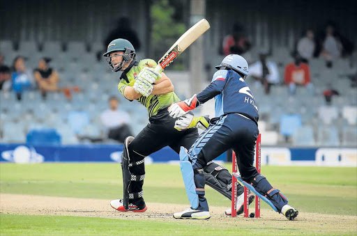 ON THE CHARGE: Jon Jon Smuts of the Warriors plays a shot to leg. Picture: ALAN EASON