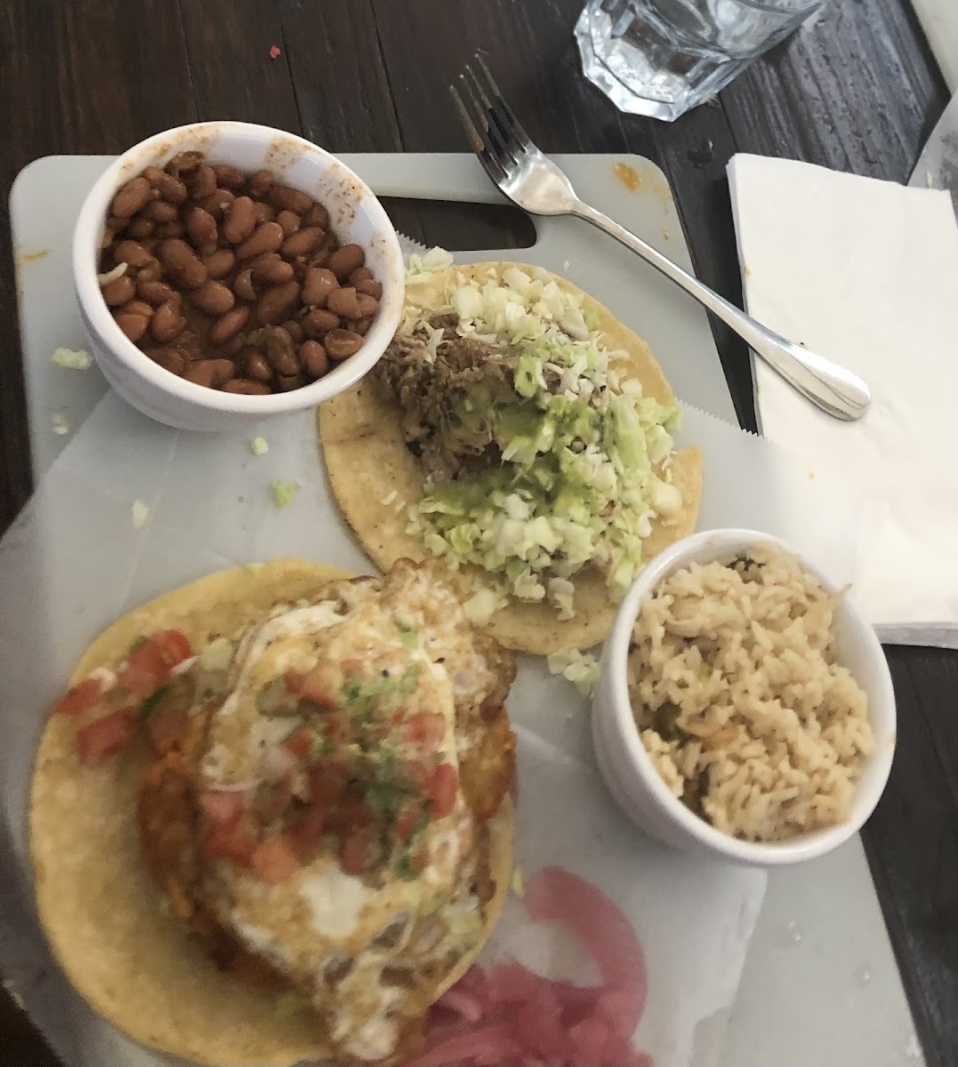 puerco verde taco, AM taco, beans and rice