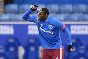Kurt Zouma of West Ham United warms up before pulling out of the matchday squad after feeling unwell prior to the Premier League match against Leicester City at King Power Stadium  in Leicester on February 13 2022.