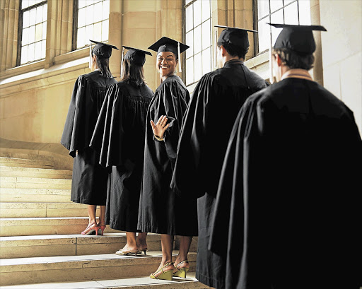 Graduates line up to be called onto the stage in this file photo.