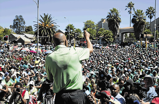 MASS APPEAL: Amcu president Joseph Mathunjwa outside Impala's Joburg offices