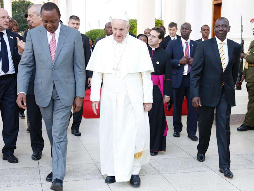 Pope with President Uhuru Kenyatta when he visited Kenya in 2015. /FILE