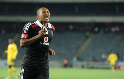 Lehlohonolo Majoro celebrating his goal against Revenue during the CAF Confederation Cup match between Orlando Pirates and Uganda Revenue Authority at Orlando Stadium on March 14, 2015 in Soweto, South Africa.