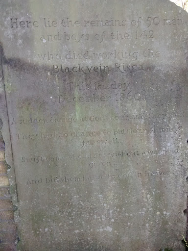 Here lie the remains of 50 men and boys of the 142  who died working the Blackvein Risca This 1st day December 1860 A sudden change at God's command and they fell. They had no chance to bid their...