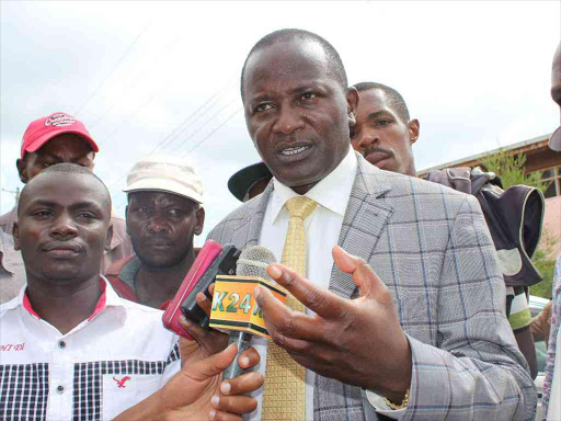 Kigumo MP Jamleck Kamau addresses journalists at Gikomora ACCS Church in Maragua on Sunday/ ALICE WAITHERA