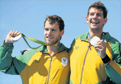 Lawrence Brittain, left, and Shaun Keeling won a silver medal for rowing at the Rio Olympics