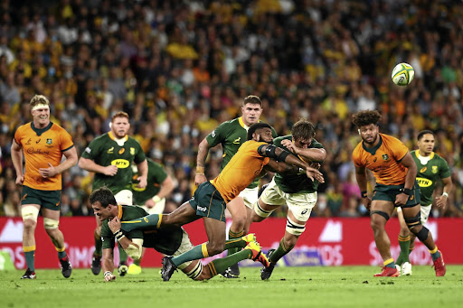 Marika Koroibete of the Wallabies offloads during The Rugby Championship clash against the Springboks at Suncorp Stadium in Brisbane on Saturday.