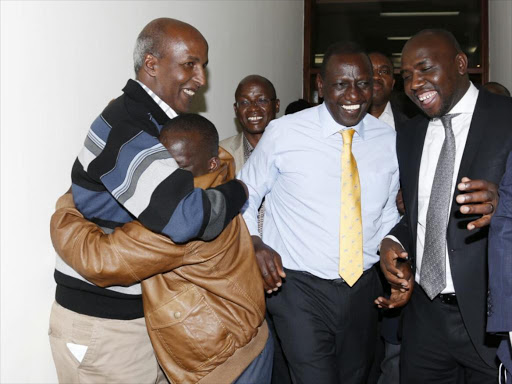 Deputy President William Ruto and journalist Joshua Sang celebrate the collapse of their ICC cases at his Karen office on April 6 / CHARLES KIMANI/ DPPS