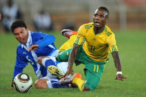 66 CAPS: Teko Modise (R) of Bafana tackled by Carlos Galledo of Guatamala during the International Friendly match between South Africa and Guatemala at the Peter Mokaba Stadium on May 31, 2010 in Polokwane. Modise first played for the South African national team during the 2007 COSAFA Cup. He made his first appearance with the senior team on 26 May 2007 against Malawi. He has scored ten goals for the national team and has been an instrumental player in many of Bafana Bafana's international matches. His last appearance for Bafana Bafana was on 12 October 2012 against Poland in the Fifa international friendly, played in Warsaw.