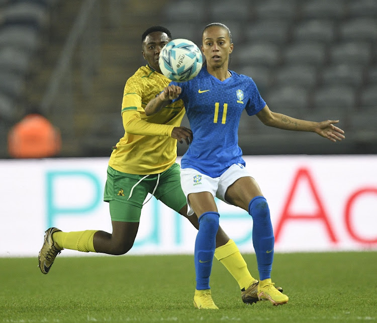 Karabo Dhlamini of SA challenges Adriana Leal da Silva of Brazil in friendly match at Orlando Stadium on September 2 2022.