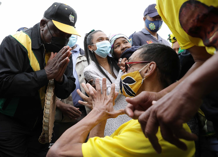 President Cyril Ramaphosa greets resident Paul Arendse during his meet-and-greet campaign on Thursday.