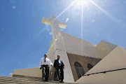 CROSS: Louis Nthane and Pieter Dirks, the former and current chairmen of the African Methodist Episcopal Church, in Piketberg, Western Cape, where congregants and the pastor are at odds