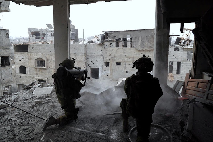 Israeli soldiers during an operation against Hamas in Gaza in this image released on November 16 2023. Picture: ISRAEL DEFENCE FORCE/HANDOUT via REUTERS