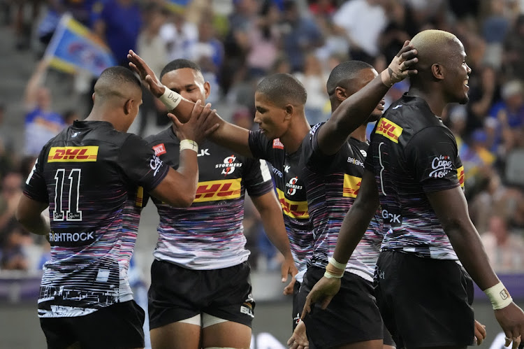 Stormers players celebrate the try of Leolin Zas during their Champions Cup match against Sale Sharks at Cape Town Stadium.