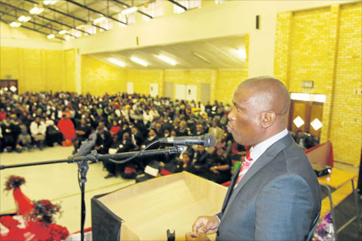 PAYING RESPECTS: Oscar Mabuyane speaks at the funeral of the late Sive Nombembe at the WSU Great Hall in Butterworth Picture: MICHAEL PINYANA