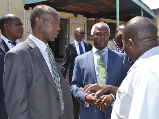 Egerton University vice chancellor James Tuitoek with Homa Bay Deputy Governor Hamilton Orata (right) and other officials after a meeting in Homa Bay town on Friday. The county will develop 1,000 acres of dry land.