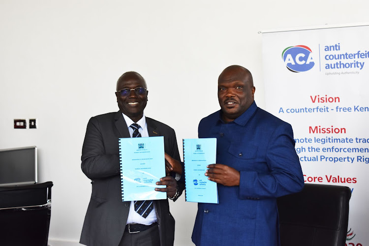 The Anti-Counterfeit Authority Executive Director Dr Robi Njoroge Mbugua and the Pharmacy and Poisons Board CEO Dr Fred Siyoi during the signing of an MoU on January 16, 2024