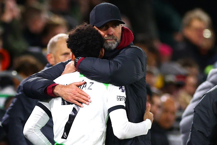 Liverpool manager Jurgen Klopp embraces Luis Diaz.