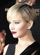DIAMOND GIRL: Jennifer Lawrence pairs classic with a bling ear cuff