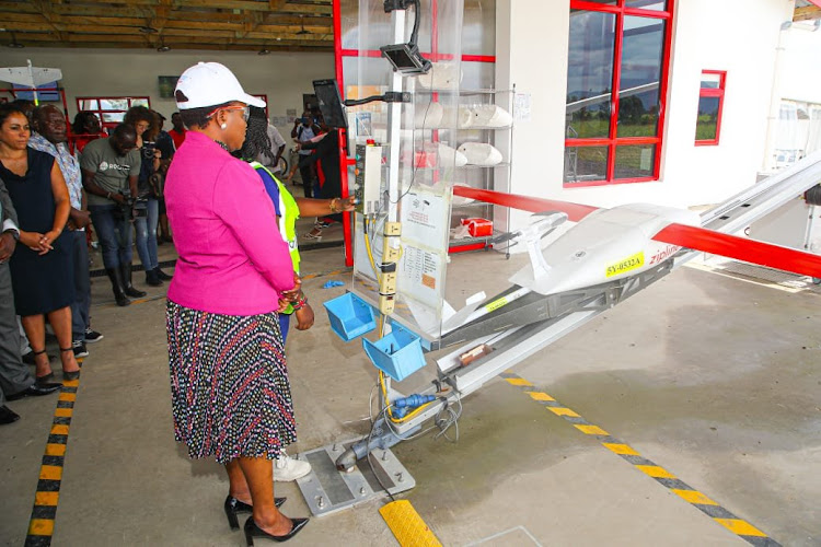 Health CS Susan Nakhumicha is shown how Zipline is using drones to safely deliver medical supplies to various destinations in the country