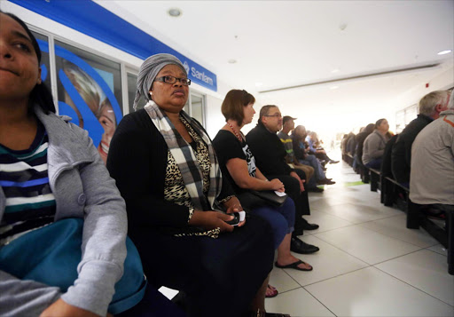 The queue outside the Home Affairs office in Wynberg at 6.30 am where domestic worker Delta Xolo, second left, are waiting every morning. April 21, 2016