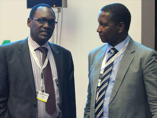 Trade Ps Chris Kiptoo with Ps trade Adok Mkenda during EAC UNCTAD trade talk in Nairobi on July 22. PHOTO/ENOS TECHE.
