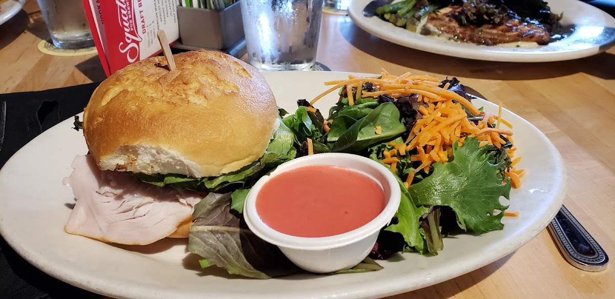 Turkey club on gf roll, with salad