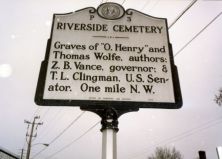 Graves of Thomas Wolfe & "O. Henry," authors; Zebulon B. Vance, governor; Thomas L. Clingman and Robert R. Reynolds, U.S. senators. One-half mile W.Plaque via North Carolina Highway Historical...