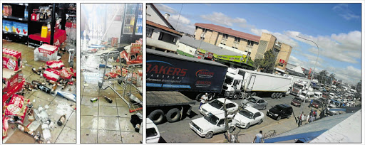 AFTERMATH: Shops were looted and traffic brought to a standstill as scores of taxi operators went on a rampage in the Mthatha city centre in protest over Police Minister Bheki Cele’s decision to close their ranks Pictures: SUPPLIED