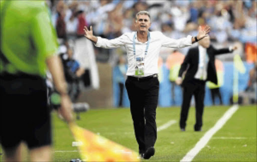 HAMSTRUNG : Iran's coach Carlos Queiroz reacts during the Group F football match against Argentina at the Mineirao Stadium in Belo Horizonte Photo: BEHROUZ MEHRI/AFP