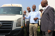 KZN health MEC Sibongiseni Dhlomo and Amajuba District Mayor, Dr Musa Ngubane, inspect stolen ambulances that were converted into taxis. Picture Supplied