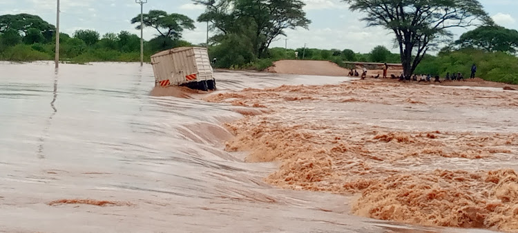 A lorry that was moving to Garissa stuck around Kona Punda area. Flash floods have completely destroyed the section. of the road rendering it impassable