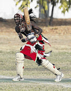Jonathan Ole Meshami, of the Maasai Cricket Warriors, plays a shot during a friendly in Mombasa, Kenya. The team is being coached by a South African woman Picture: REUTERS