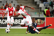 Tercious Malepe of Ajax Cape Town challenged by Harris Tchilimbou of Free State Stars during the Absa Premiership 2017/18 football match between Ajax and Free State Stars at Cape Town Stadium, Cape Town on 26 January 2018.