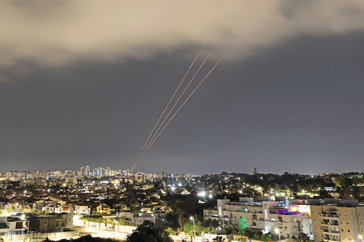 Brinkmanship: An antimissile system operates after Iran launched drones and missiles at Israel, seen from Ashkelon, April 14 2024. Picture: Reuters/Amir Cohen