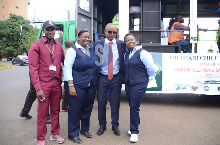 Judiciary officer Dan Hibichu, magistrate Martha Nanzushi, Geoffrey Onsarigo and Esther Kimilu during the traffic open day flag off at Milimani Law Courts on March 20, 2024