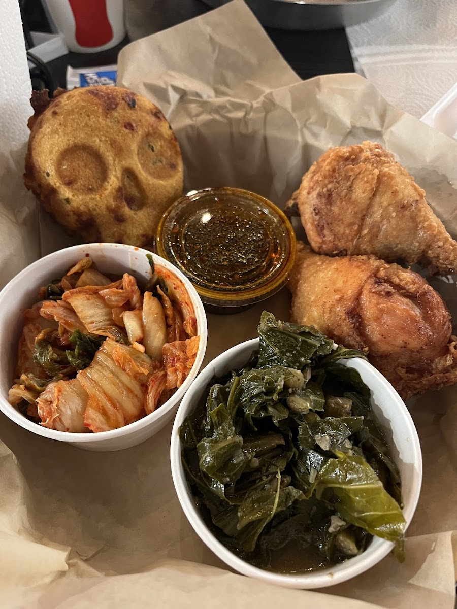 Chicken legs, collard greens, kimchi and jalapeño cheddar cornbread all delicious