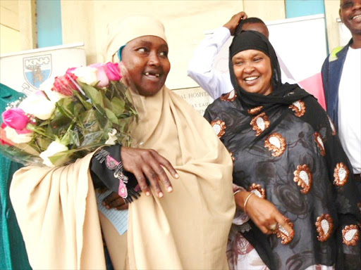 IT'S A HARD LIFE: Fatuma Ibrahim, who was flown to Nairobi from Wajir with a knife stuck in her face (inset) after she was attacked by her husband, with Wajir woman representative Fatuma Ibrahim Ali at KNH on January 16.
