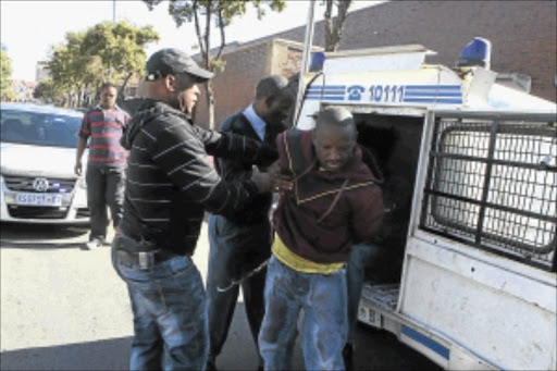 GOTCHA: Would-be escapee prisoners were re-arrested after they attempted to escape from the Germiston Magistrate's Court on Friday. PHOTO: MOHAU MOFOKENG