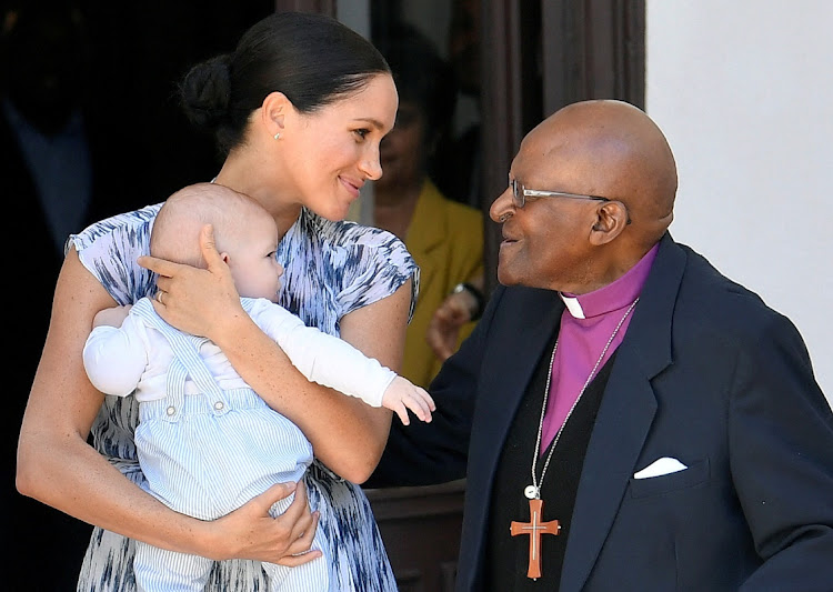 Britain's Meghan, Duchess of Sussex, holding her son Archie, meets Archbishop Desmond Tutu at the Desmond & Leah Tutu Legacy Foundation in Cape Town, South Africa, September 25, 2019.