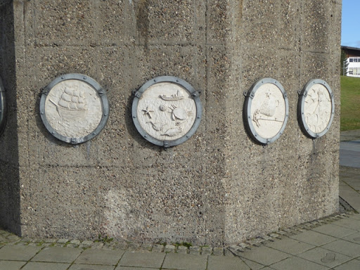 Mounted round the base of the sculpture "Shadows in another light" NZ4057 : "Shadows in another light" are a number of plaques representing aspects of the history and economy of Sunderland. ©...